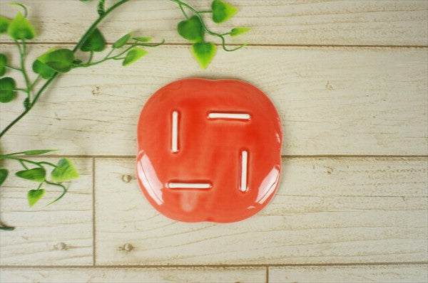 Botton view of red musubi plate