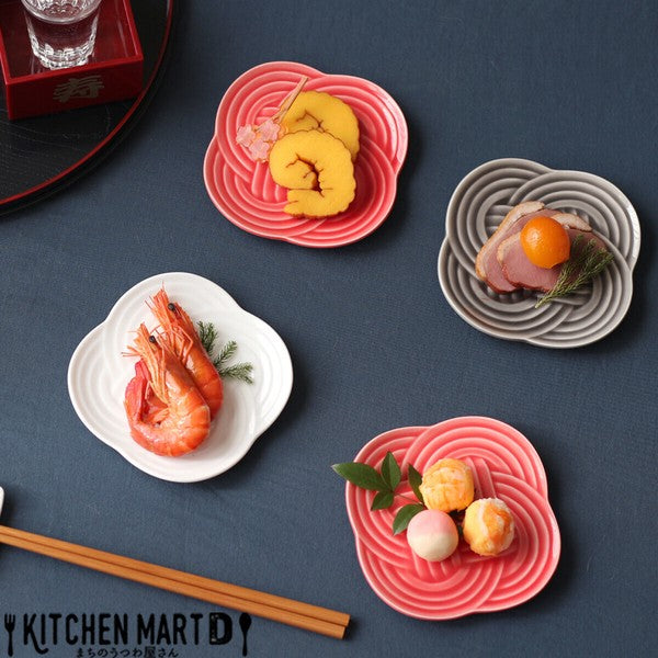 Japanese Musubi small plates with festive appetizers, red, white, and gray set