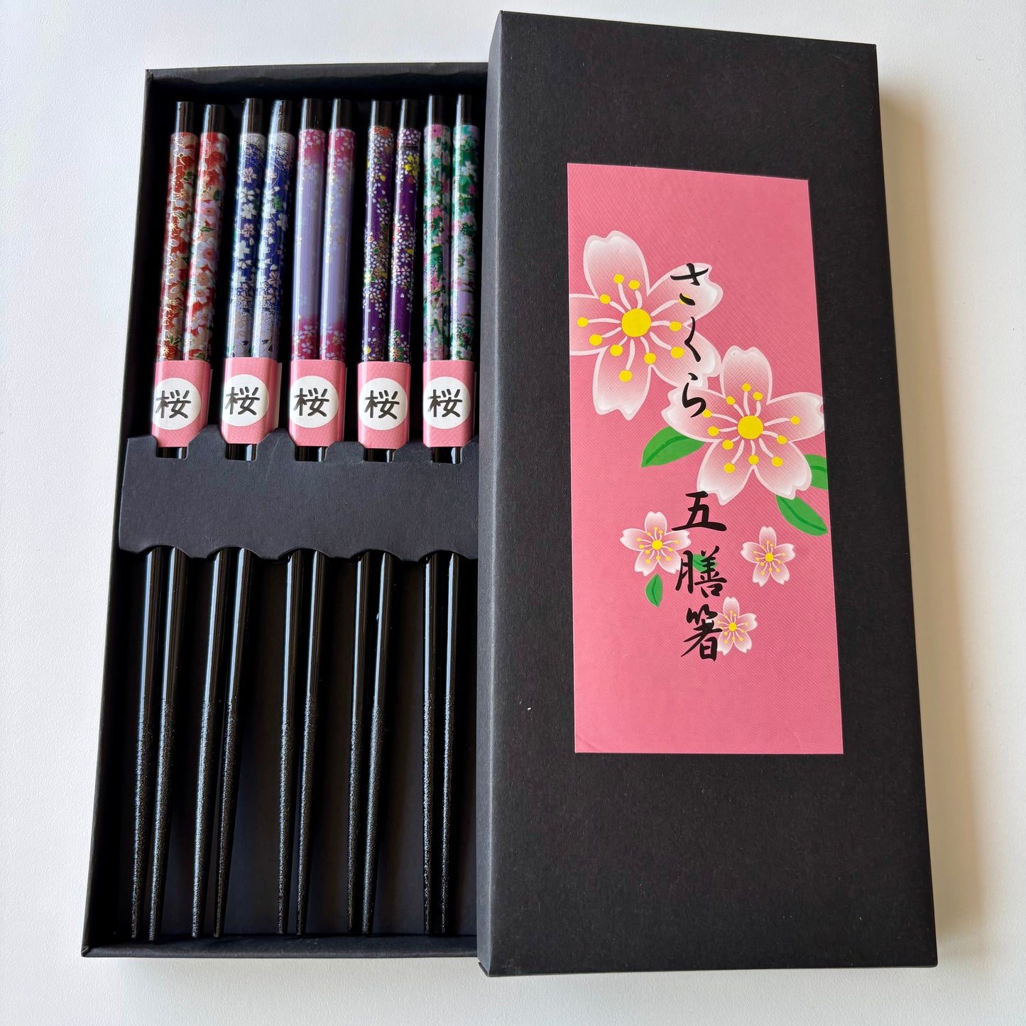 Five pairs of Japanese bamboo chopsticks with sakura designs in gift box