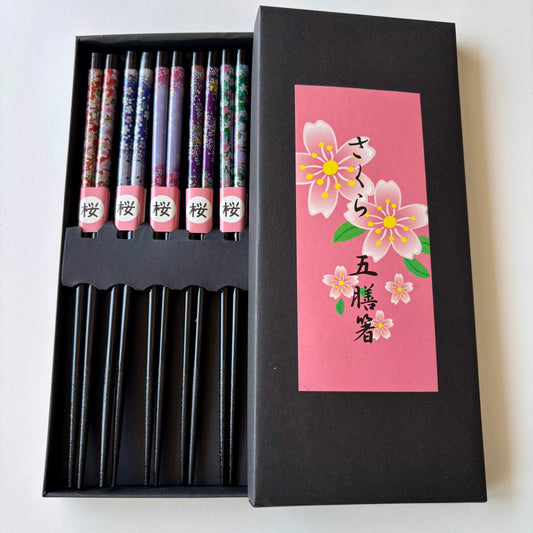 Five pairs of Japanese bamboo chopsticks with sakura designs in gift box