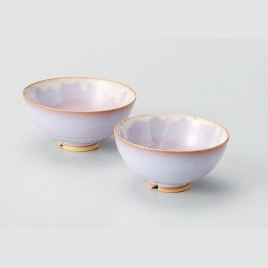 Set of two handcrafted Hagi Murasaki bowls in soft purple crackle glaze, featuring natural earthy tones and varying sizes